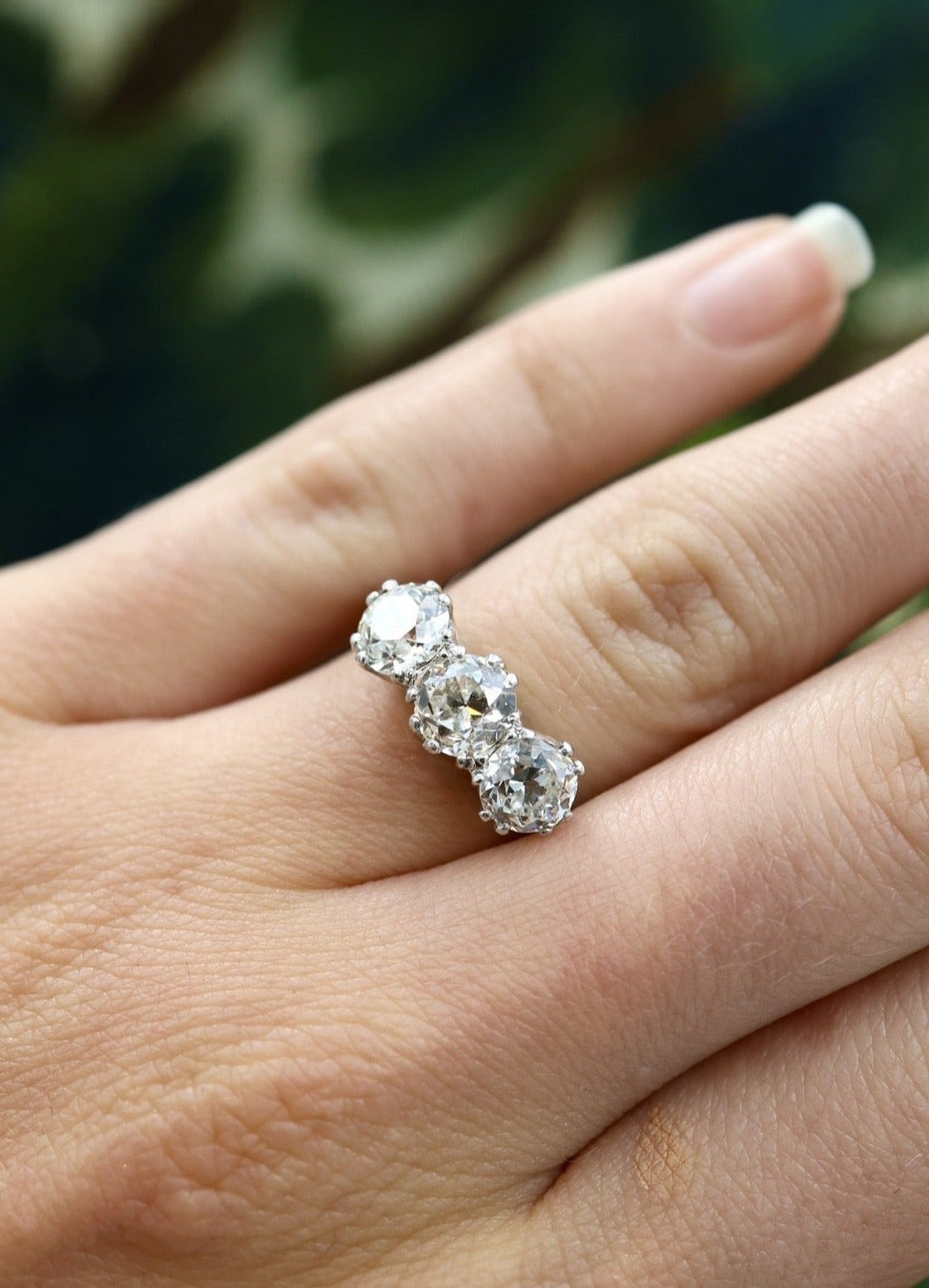 A very fine 18 carat White Gold (stamped), Three Stone Engagement Ring set with 2.25 Carats of Old Cut E - F Colour, VS Clarity Diamonds. Pre-owned.