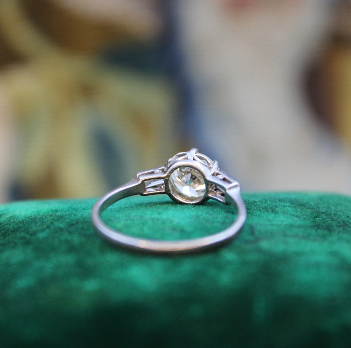 A Beautiful 1.04 Carat, Art Deco, Diamond Solitaire Engagement Ring, with Baguette-cut Diamond  Shoulders, set in Platinum.  Circa 1930 - Robin Haydock Antiques