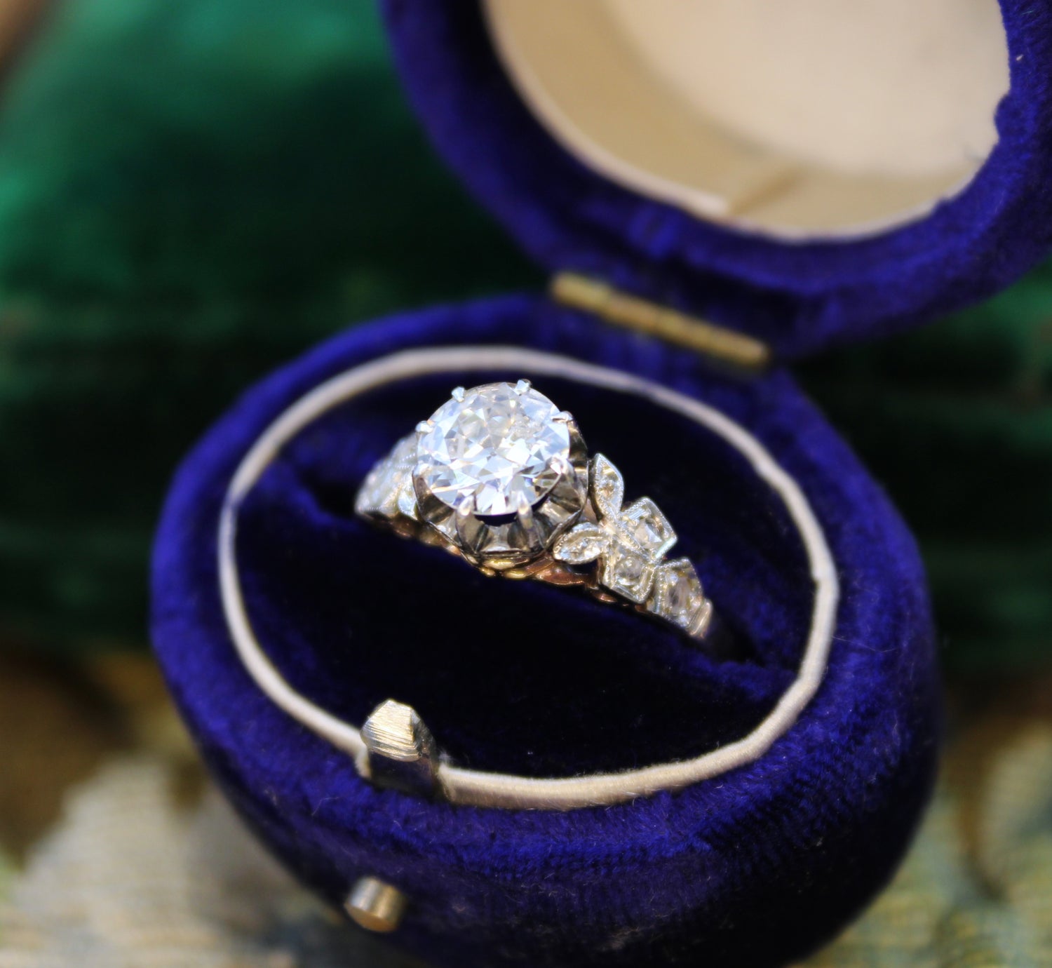 A Beautiful 0.85 Carat Diamond Solitaire Engagement Ring, with detailed Diamond set Foliate Shoulders, Plausibly English, Circa 1920 - Robin Haydock Antiques