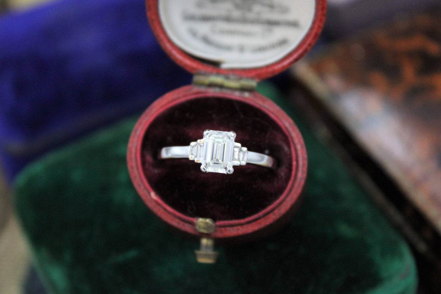 A very fine Emerald Cut Diamond Ring with Baguette Cut Stepped Shoulders set in 18ct White Gold, Pre-owned - Robin Haydock Antiques