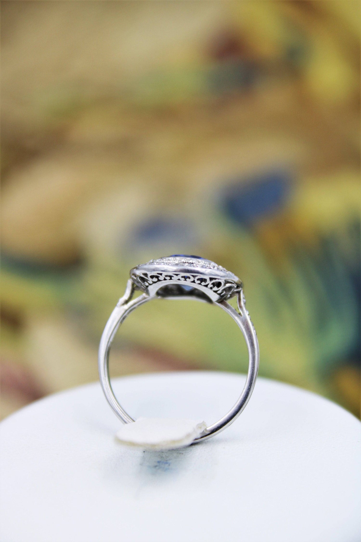A fine Platinum Oval Ceylon Sapphire & Double Diamond Cluster Ring, Circa 1940. - Robin Haydock Antiques