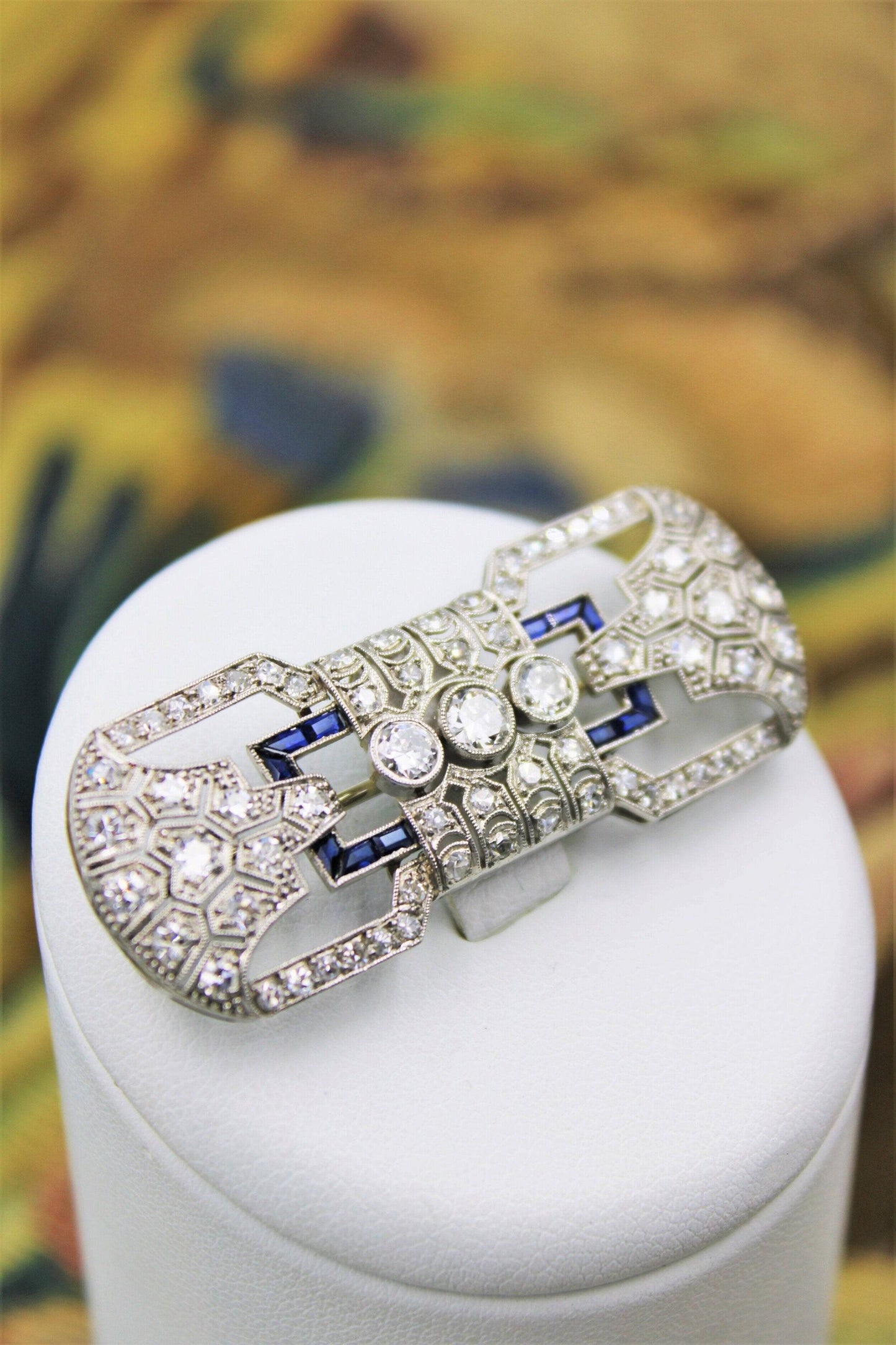 A very fine Platinum, Diamond and "Calibre cut" Sapphire "Art Deco" Brooch, Circa 1930. - Robin Haydock Antiques