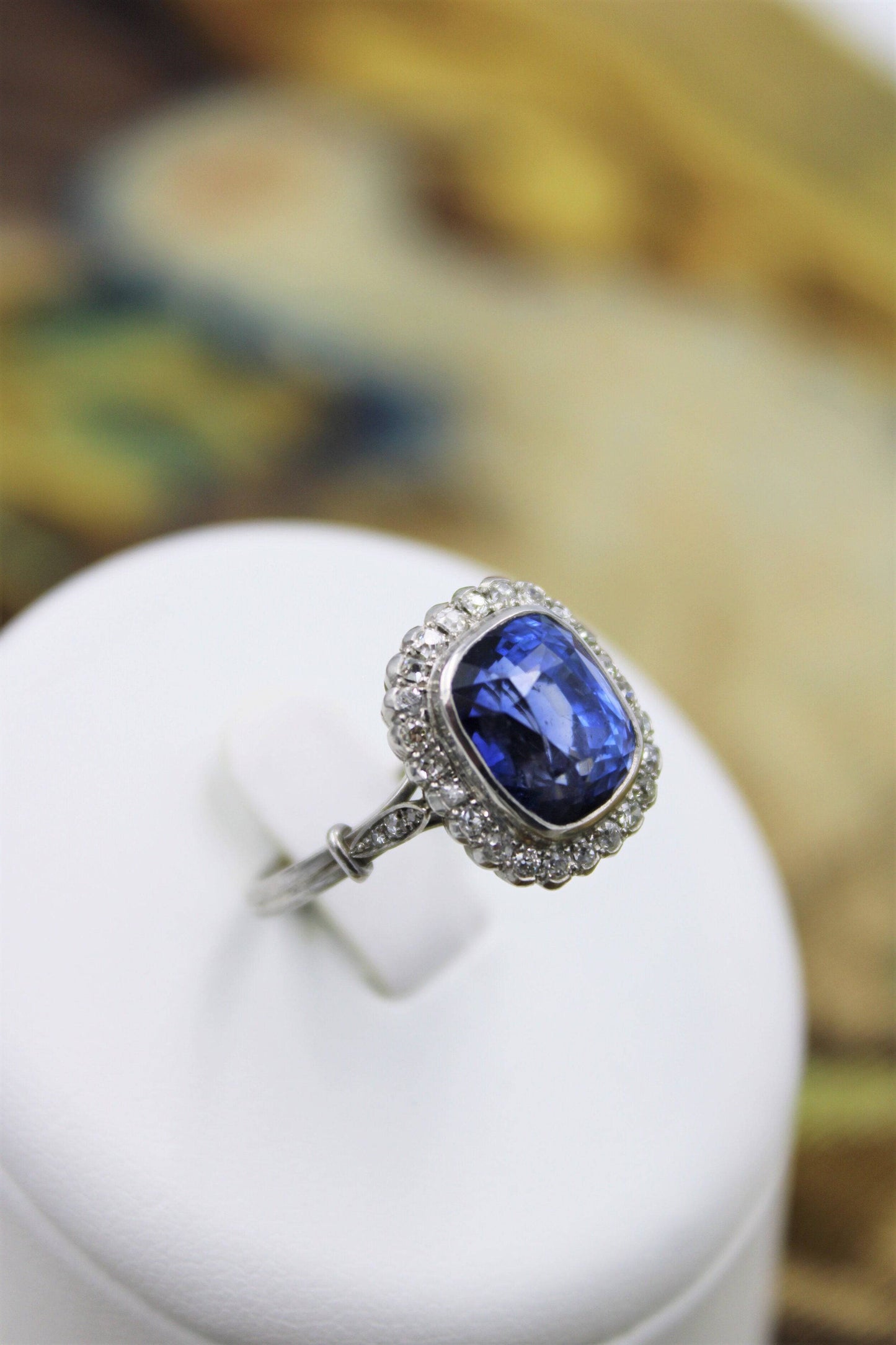 An exquisite 8.10ct Natural Untreated Ceylon Sapphire and Diamond Cluster Ring mounted in Platinum, English, Circa 1925 - Robin Haydock Antiques