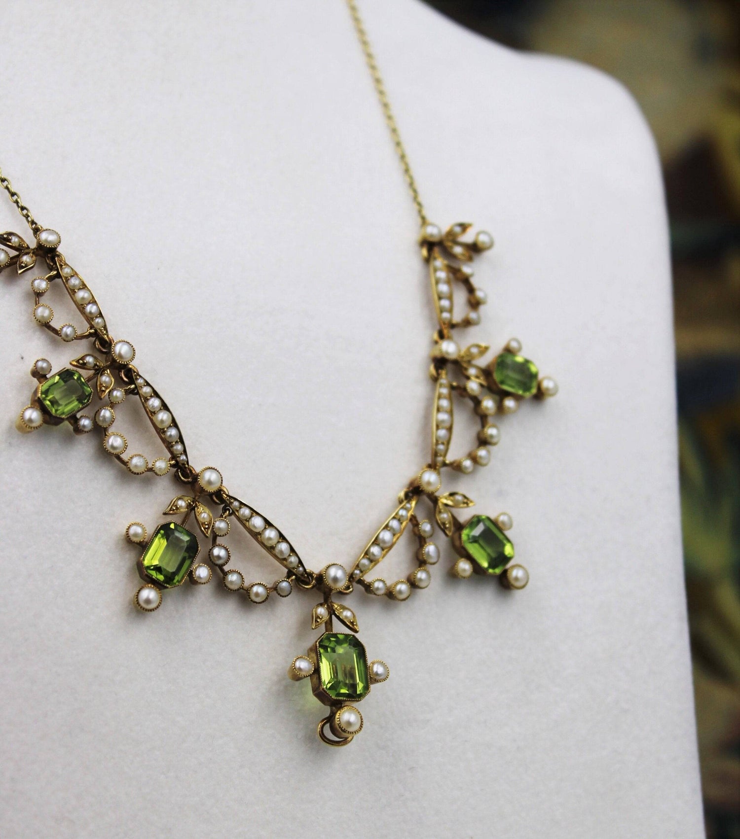 An exquisite Peridot & Seed Pearl Festoon Necklace with a matching Quatrefoil style detachable Pendant/Brooch in 15 Carat Yellow Gold, English, Circa 1900 - Robin Haydock Antiques