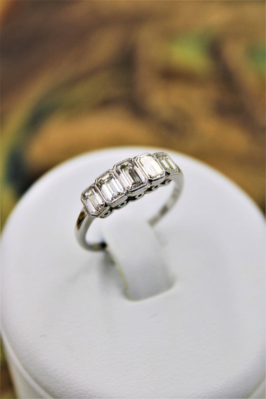 A very fine five-stone Graduated Emerald Cut Diamond Ring set in Platinum, Pre-owned - Robin Haydock Antiques