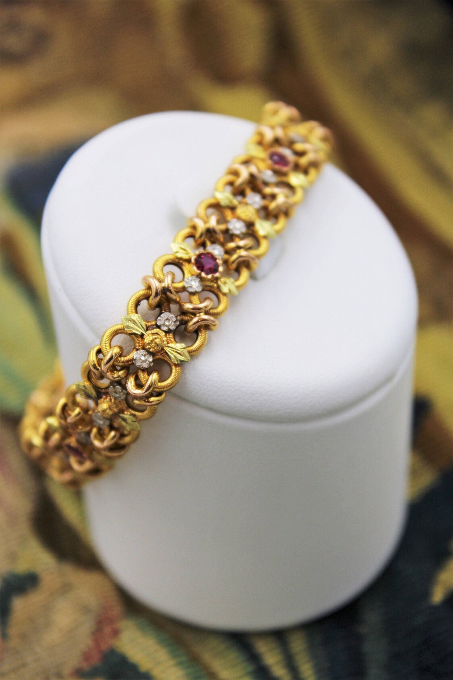 A very fine 18 Carat Green, Yellow and Pink Gold (French marked) Ruby set bracelet, French, Circa 1935 - Robin Haydock Antiques