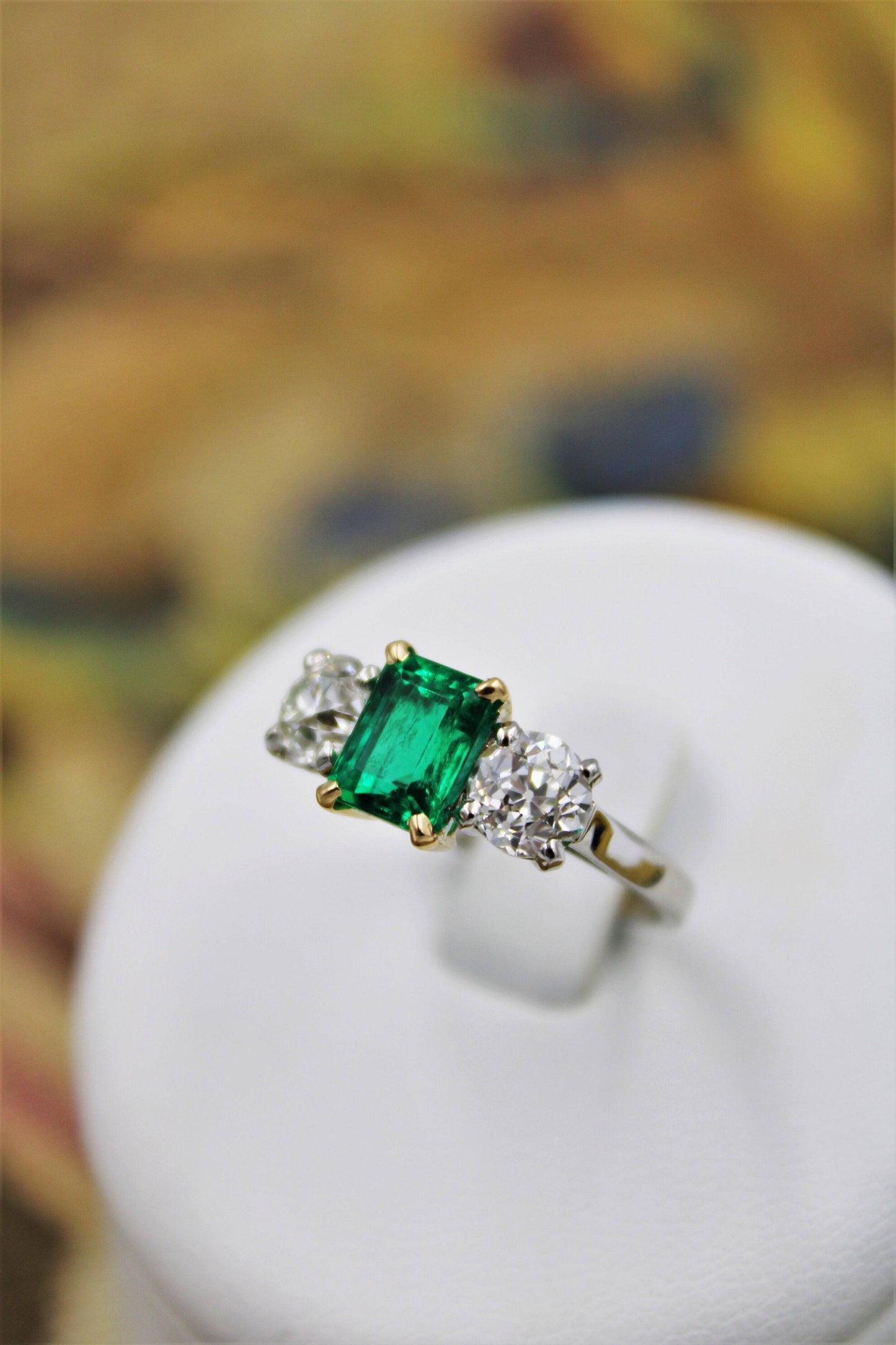 An exceptional Emerald and Diamond Three Stone Ring mounted in Platinum (Marked) and 18 Carat Gold, Pre-Owned - Robin Haydock Antiques