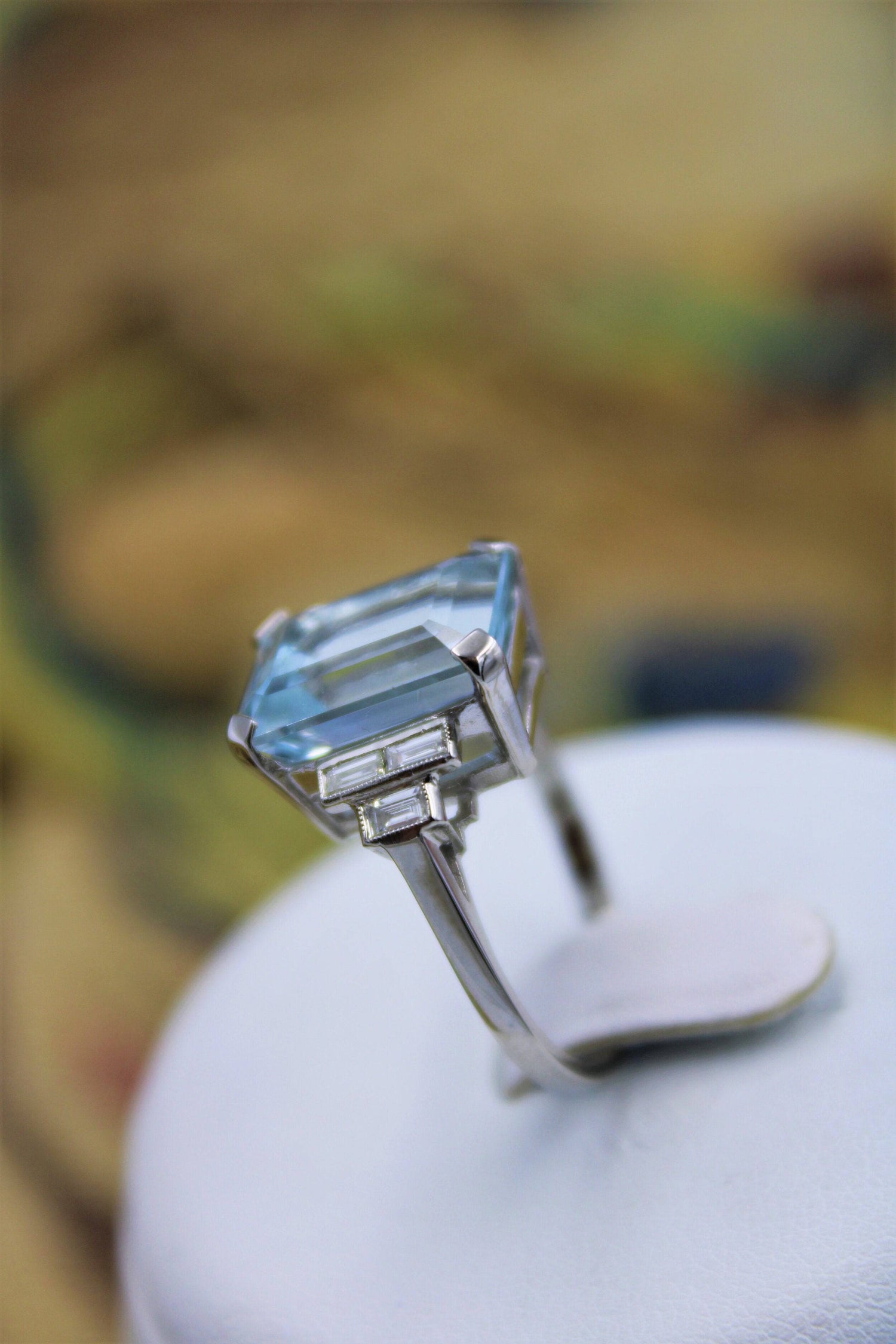 A very beautiful Platinum (marked) Aquamarine of approximately 8 Carats and Diamond stepped shouldered Ring, Mid 20th Century. - Robin Haydock Antiques